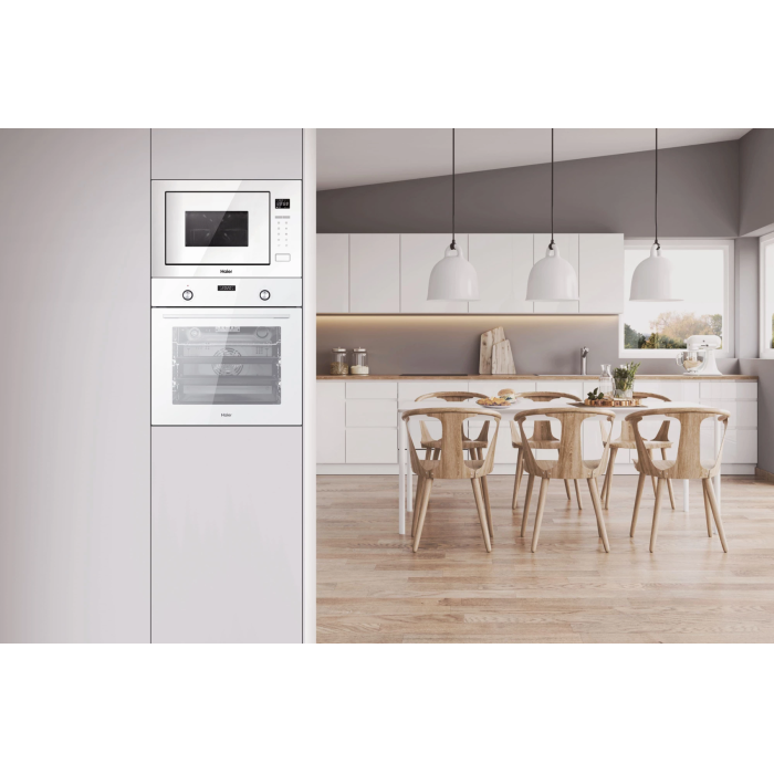 Встраиваемая микроволновая печь Haier HMX-BTG259W: объем 25 л, мощность 900 Вт, гриль, электронное управление.