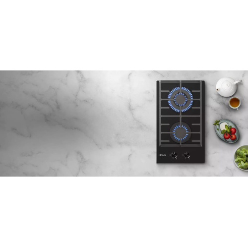 Газовая варочная поверхность Haier HHX-G32CWLB с чугунными решетками, LED индикаторами и интегрированным электроподжигом для удобства использования.